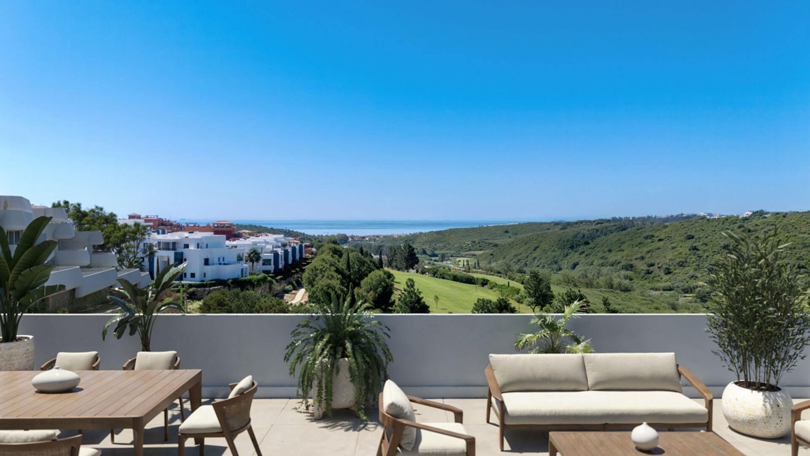 Terras in Skye Casares met uitzicht op zee en groene omgeving